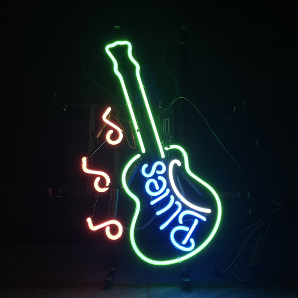 Blues Guitar Neon Signs Light glowing mounted on a wall