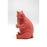 Pink hippo figurine sitting upright with gold-painted ears, claws, and toenails, shown against a plain white background.