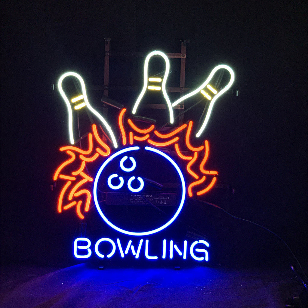 Bowling Balls Neon Sign lit in a dark room showing neon glow with bowling pins and ball design