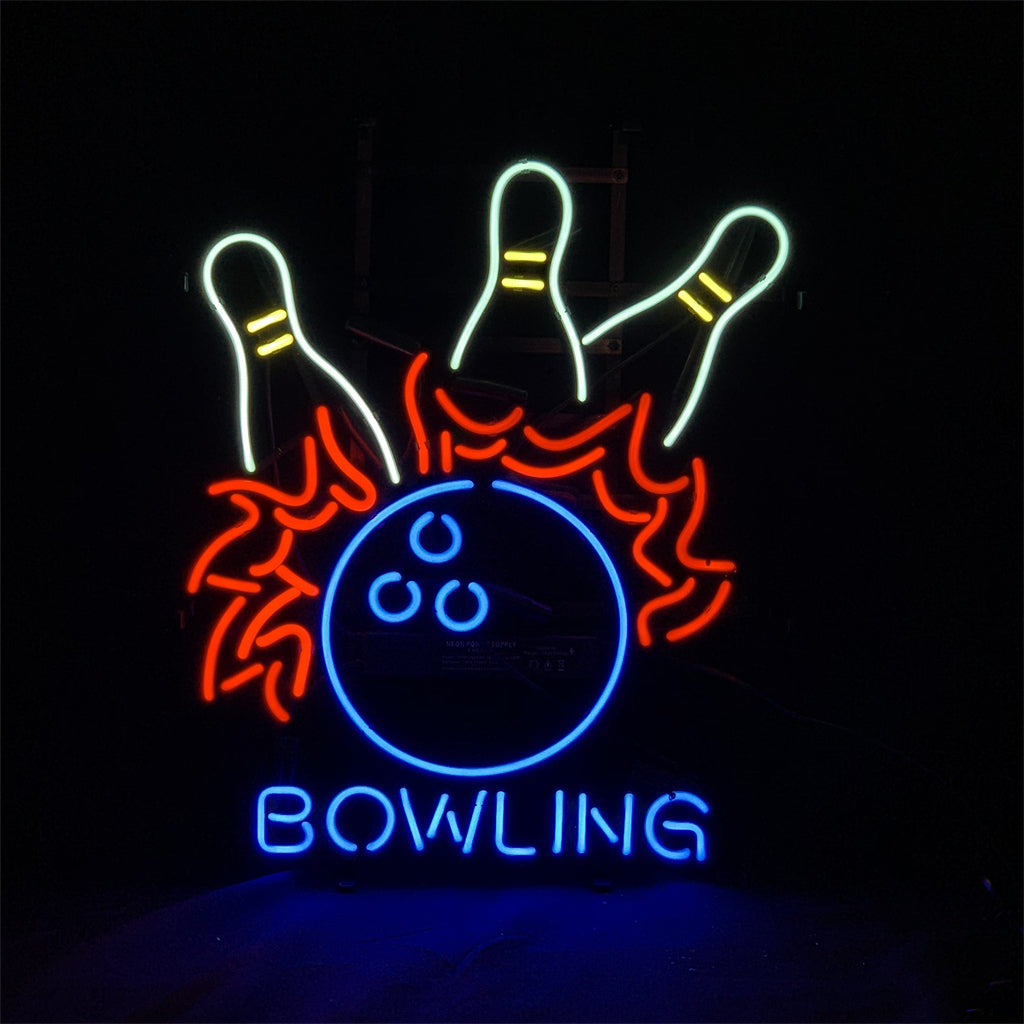 Neon sign depicting a blue bowling ball hitting three white bowling pins with yellow stripes, surrounded by red pin splash and the word 'BOWLING' in blue letters below.