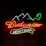 Neon sign with red 'Budweiser' text, white mountain outline above, green mountain details, and yellow-bordered white 'Montana' below on a dark background.