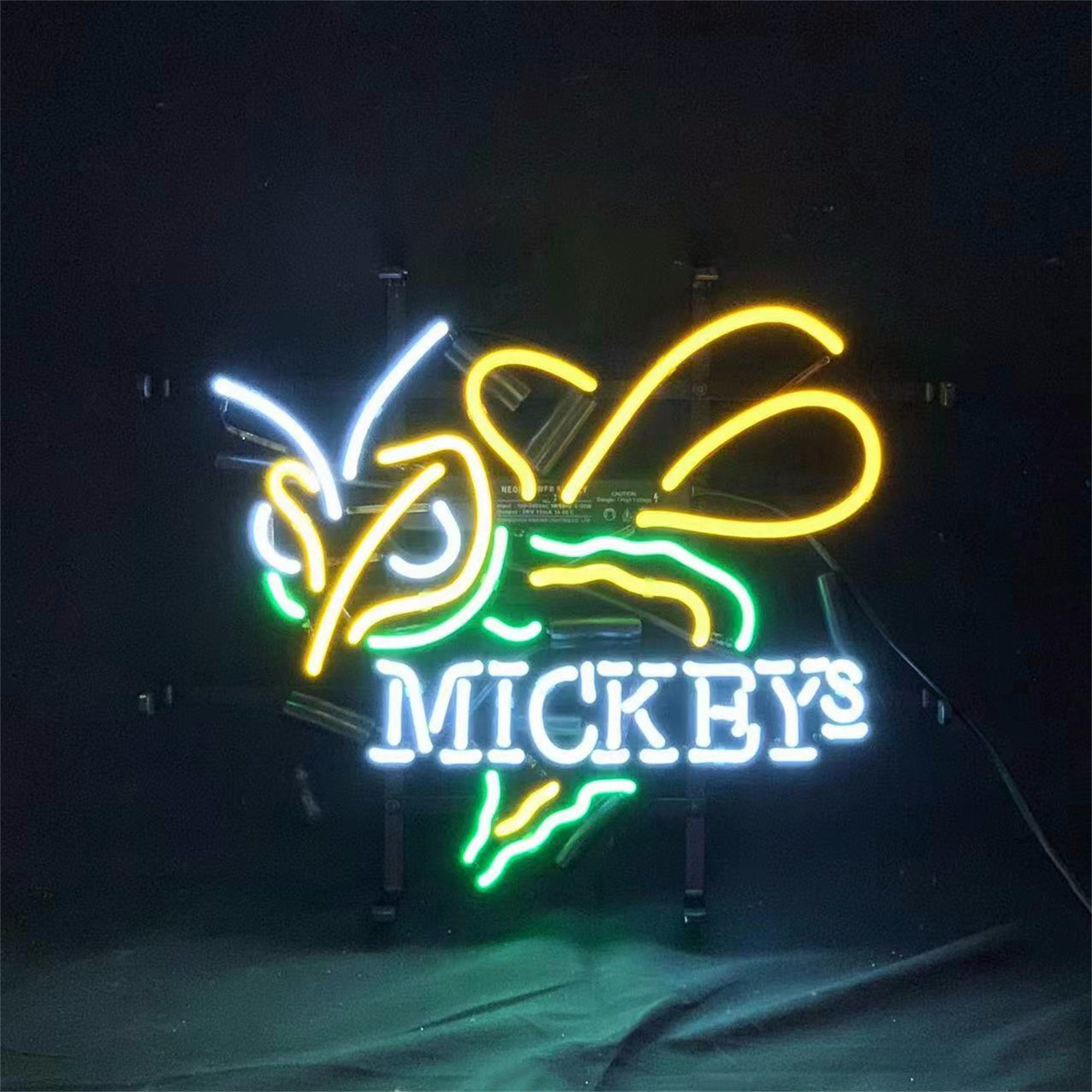 Bumblebee Mickeys Neon Sign featuring bright yellow and black neon design on a metal grid backing