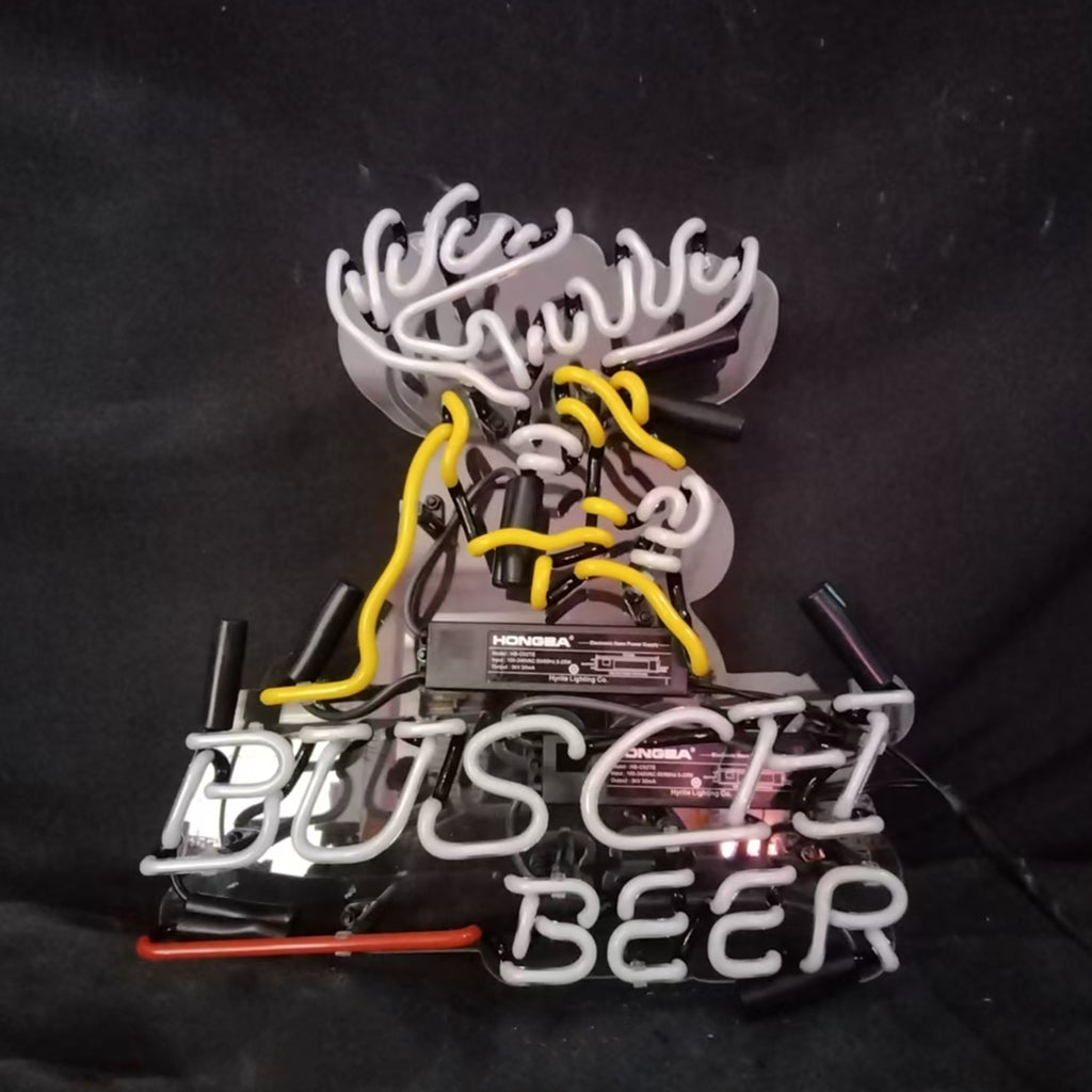 Neon sign featuring a white and yellow outline of a deer head above the white text 'BUSCH BEER' on a black background.