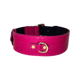 Wide fuchsia collar with a textured snake pattern and a small gold-tone D-ring attached by two gold rivets