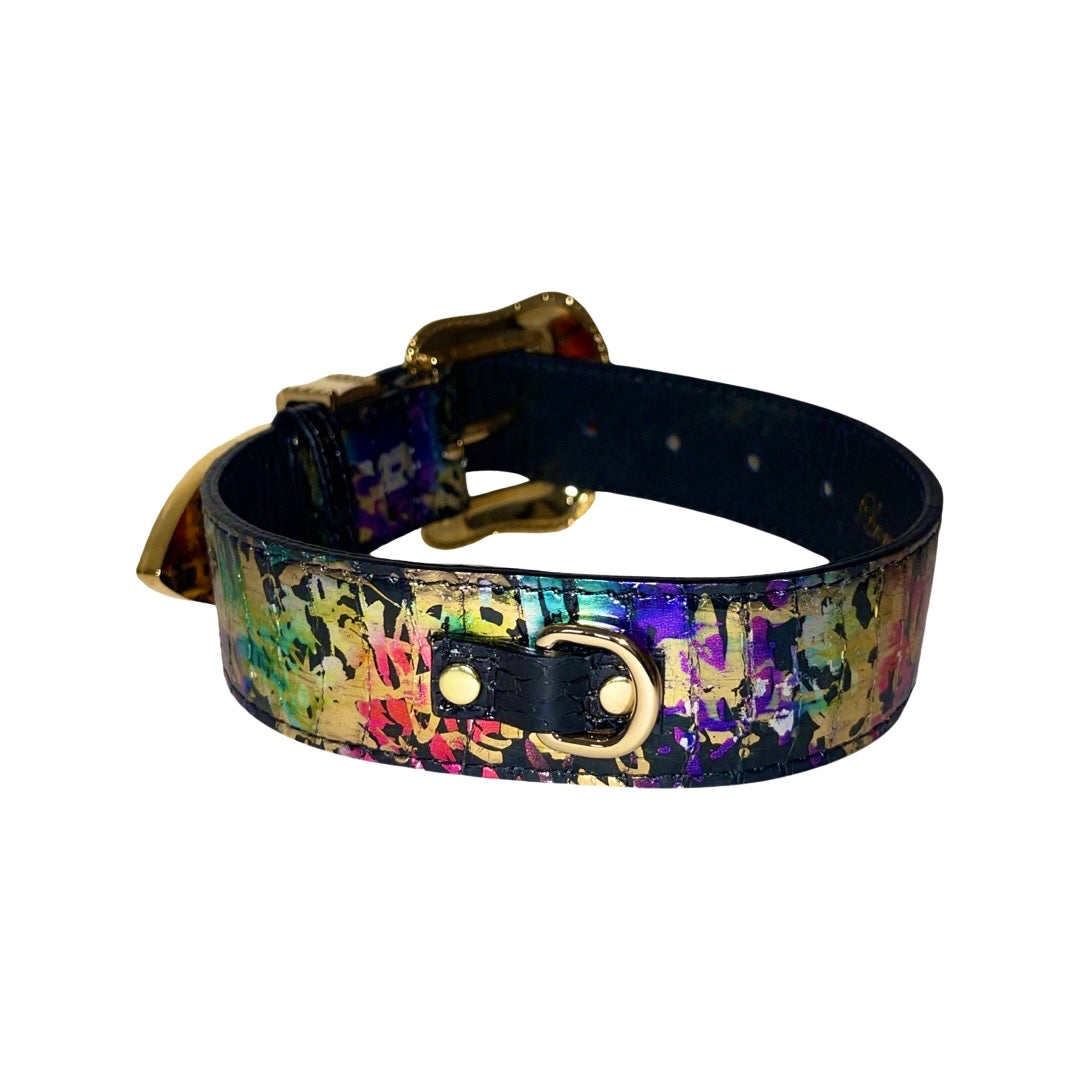 Colorful snake collar with artistic splashes of gold, purple, and black, featuring gold-tone hardware and a small D-ring on a black interior.