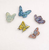 Yellow "Butterfly Wishes" acrylic wall contour artwork mounted on a white wall