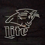 White neon sign depicting a roaring panther head above the word 'Lite' on a black background