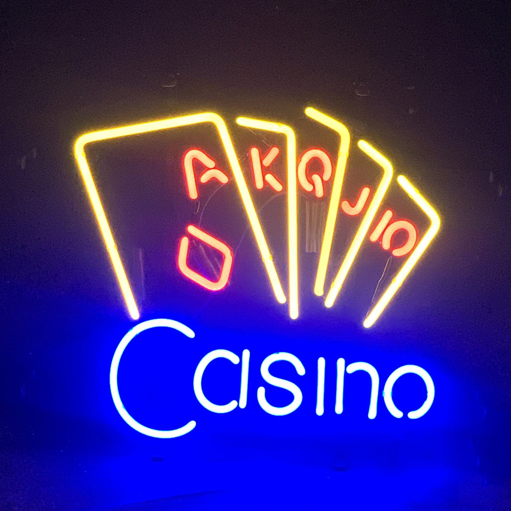 Casino Poker Neon Sign Light glowing with red, green, and white neon tubes on a metal grid backing