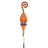 Orange metal cat garden stake with a long spiral tail, exaggerated eyes, nose, and whiskers, topped with a tightly coiled spring at the bottom.