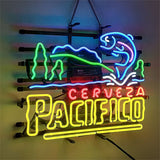 Neon sign featuring a jumping blue fish above green underwater plants with 'Cerveza Pacifico' in red and yellow letters below, mounted on a black frame.