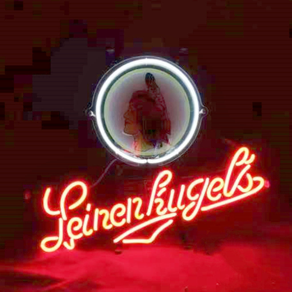 Round neon sign with a Native American profile outlined in white and red neon, featuring red neon cursive script spelling 'Leinenkugel's' below it.