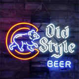 Neon sign featuring an orange and white bear inside a large orange letter C, next to white Gothic script reading 'Old Style' and blue block letters spelling 'BEER' against a dark brick wall.