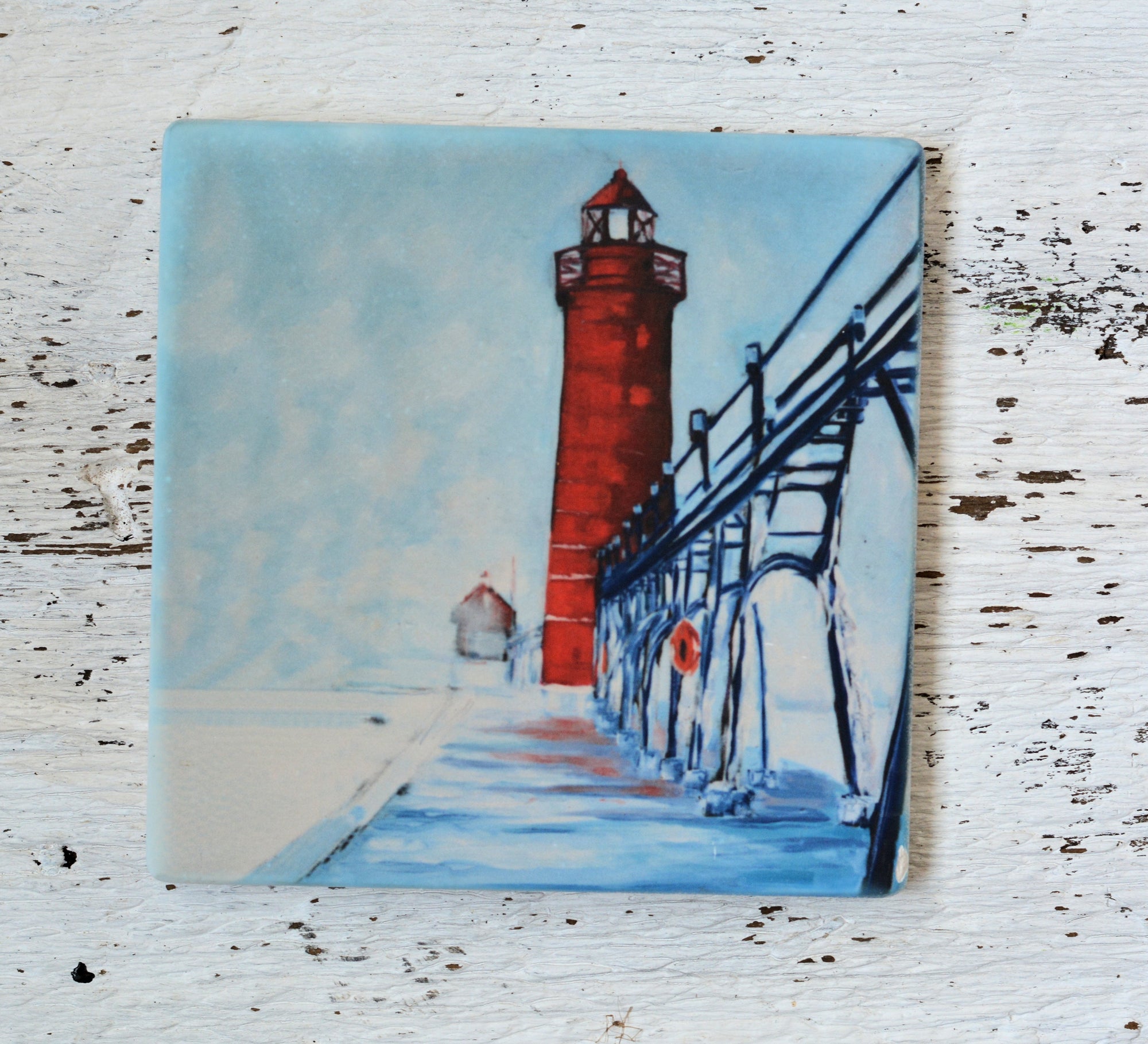 Winter's Magic Grand Haven Lighthouse coaster with bright coastal artwork by Christi Dreese