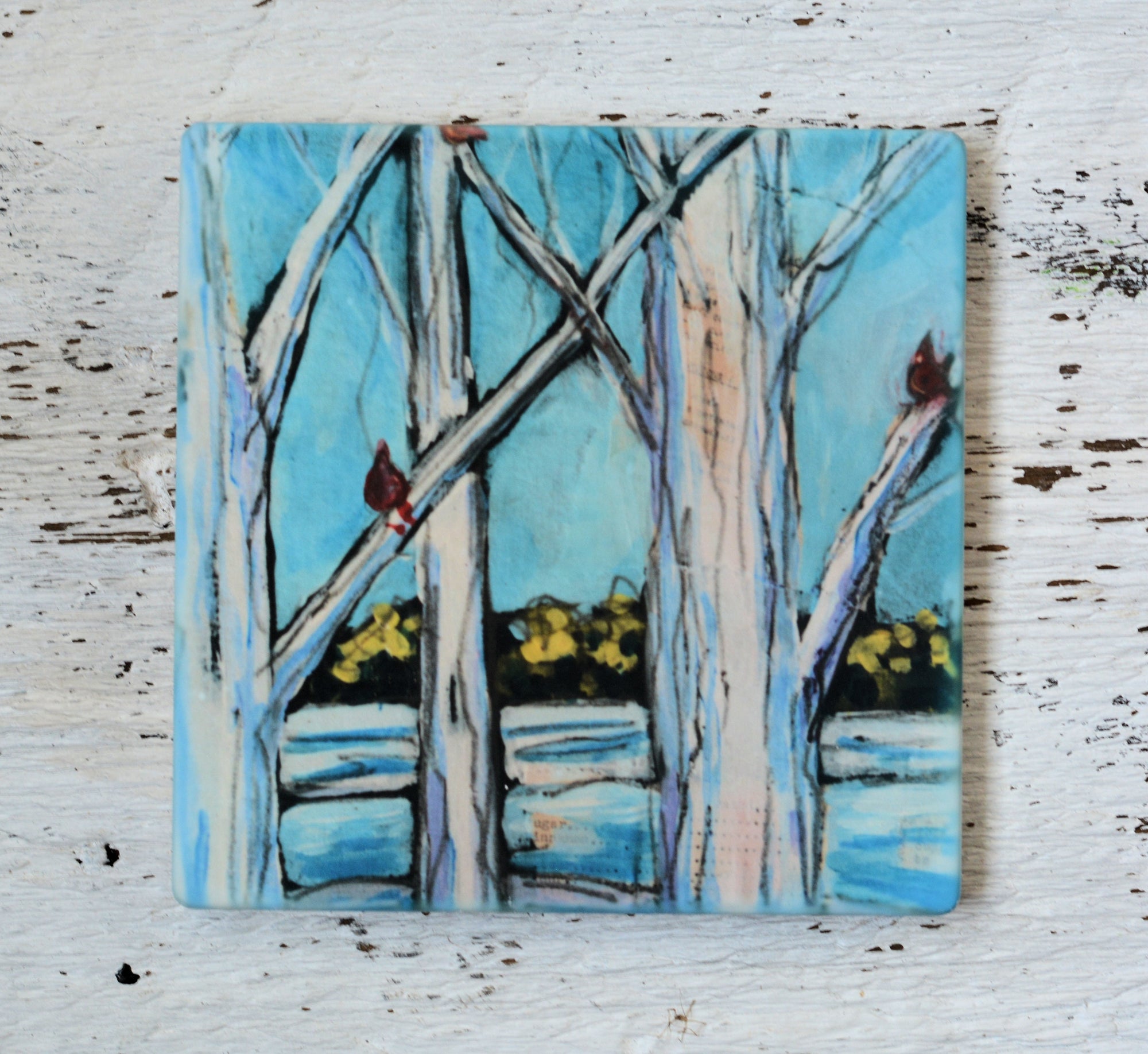 Winter Cardinals coaster featuring bright red cardinals on a natural background