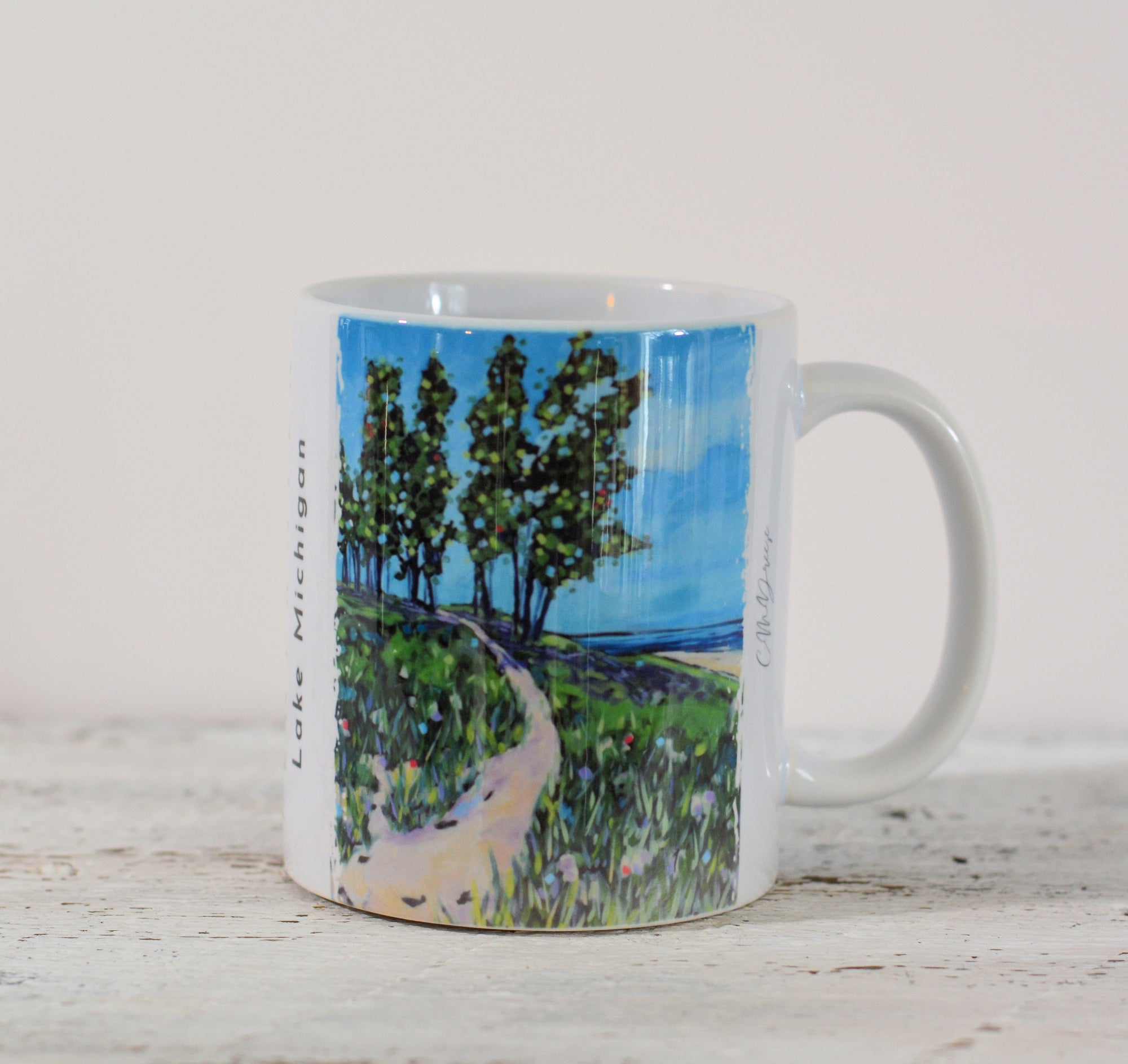 Ceramic coffee mugs and stainless steel tumbler featuring original design 'A Path to the Lake' by Christi Dreese