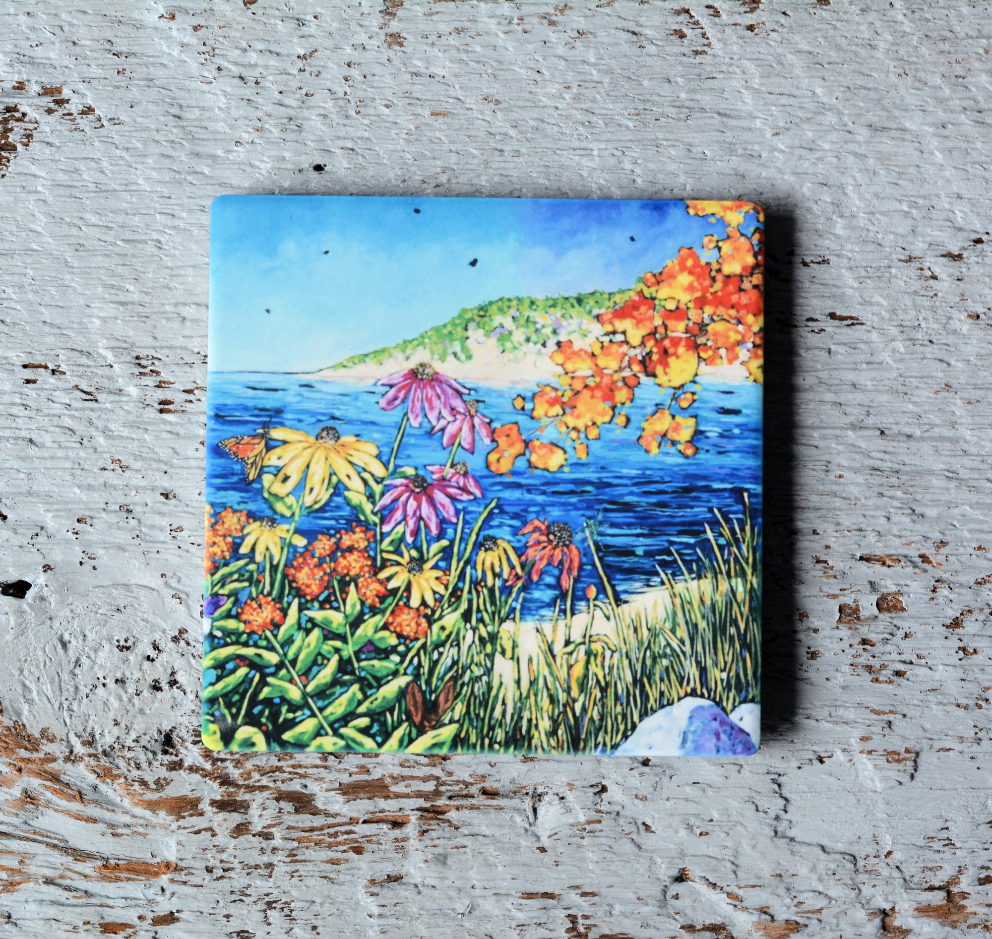 Colorful Simple Pleasures - Autumn coasters displayed on a tabletop with bright artwork
