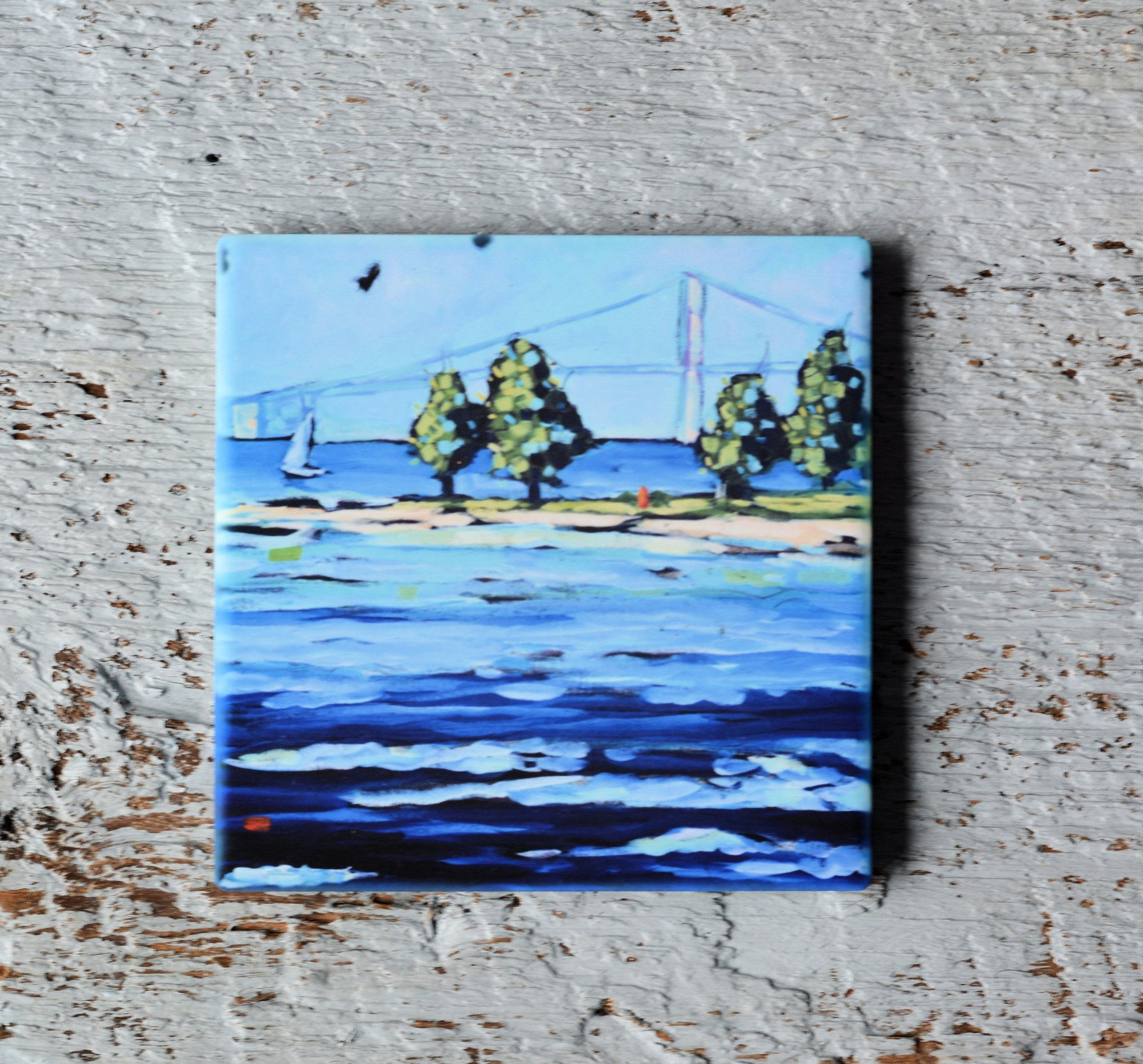 Set of coasters with colorful painting inspired by Mackinac Bridge by Dreese Fine Art