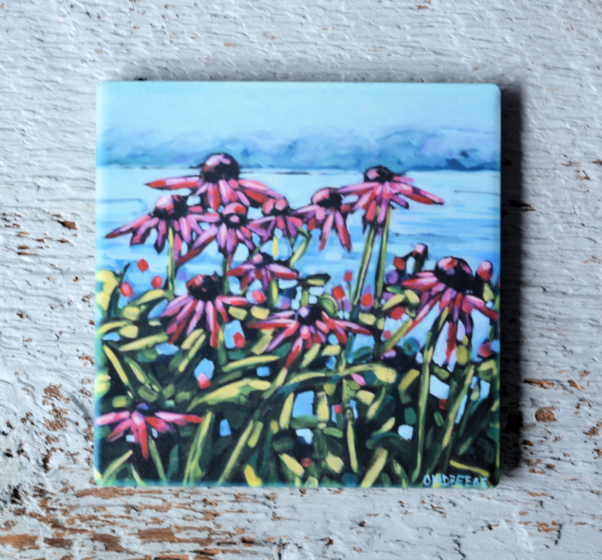 Bright colorful coaster and trivet featuring Christi Dreese's original art designs