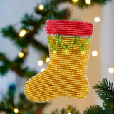 Handmade Beaded Christmas Stocking Ornament with shimmering beads in red, green, white, black, and cream hues