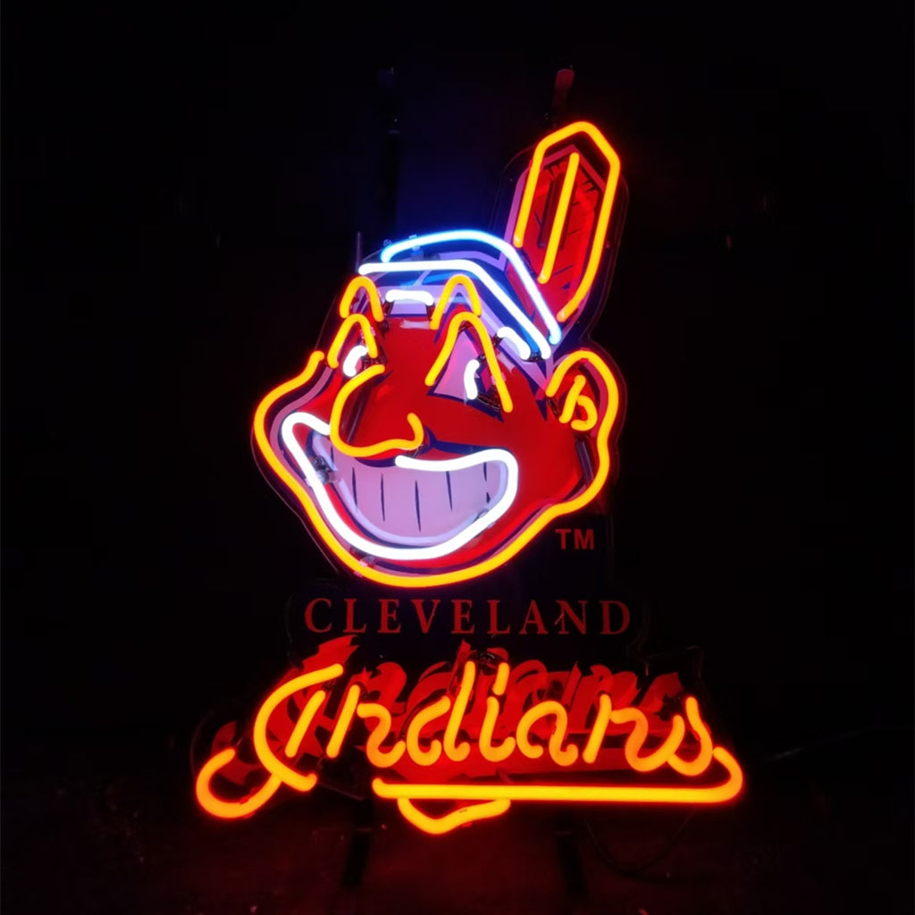 Neon sign featuring Cleveland Indians mascot in red, white, and yellow with the word 'Cleveland Indians' in red and orange neon below