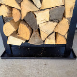 Woodhaven Multi-Purpose Firewood Rack Mat showing raised edges and waterproof surface