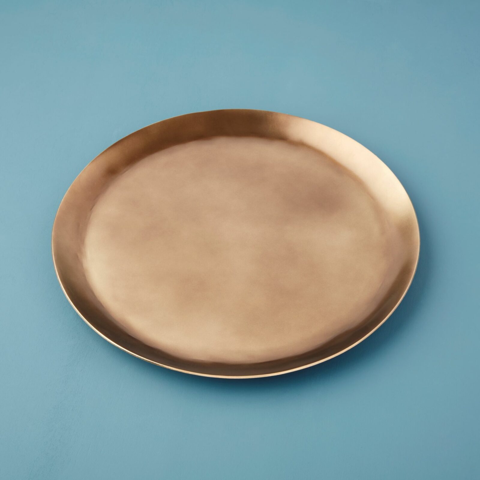 Cobblestone textured aged bronze charger plate with rustic finish