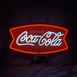 Red and white neon sign shaped like a bowtie with 'Drink Coca-Cola' in cursive font glowing against a dark background.