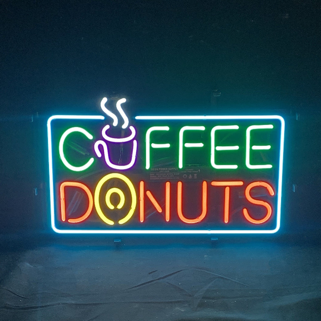 Coffee Donuts Neon Signs illuminated on a wall