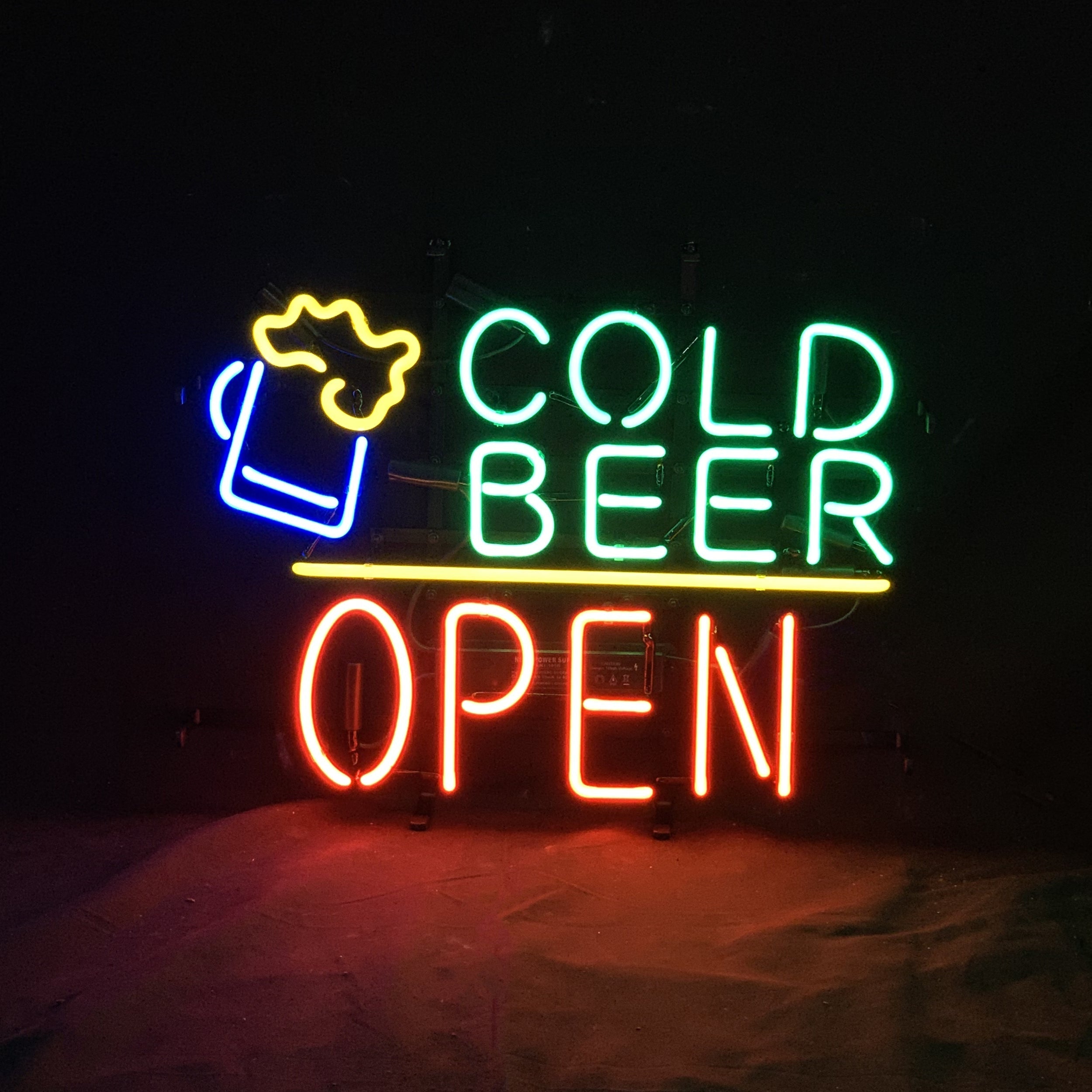 Cold Beer Open Neon Signs Light glowing on metal grid backing