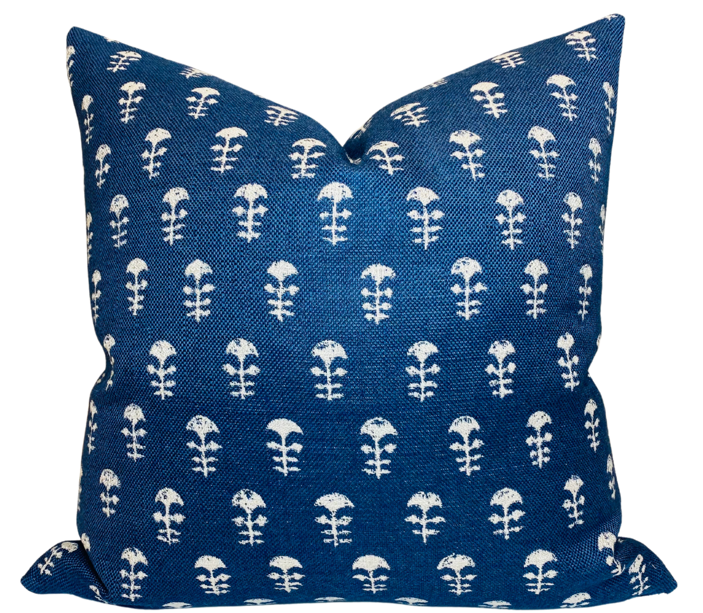 Yukka Woven Pillow Cover in Atlantic Blue displayed on a sofa