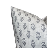 Square pillow cover in ash grey fabric featuring a repeating tonal pattern of small, dark grey motifs arranged in rows against a textured background.
