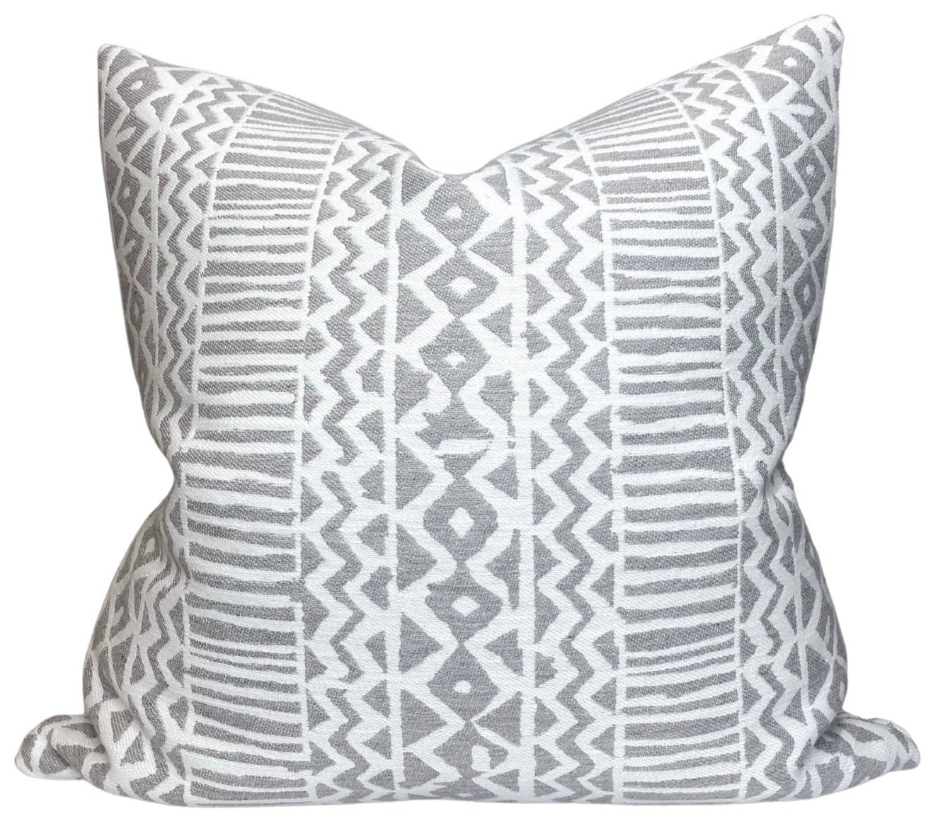 Veranda Zigzag Pillow Cover in Silverbirch resting on a neutral-toned sofa