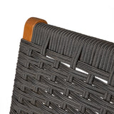 Close-up of a lounge chair backrest featuring tightly woven dark gray cords with a smooth, light brown wooden frame corner.