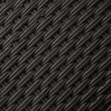 Close-up of dark gray and black woven synthetic fibers forming a textured, crisscross basket weave pattern