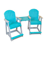 Two turquoise and gray wooden chairs connected by a small table, each chair with armrests and a footrest, shown against a white background.