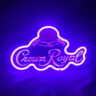 Crown Royal Whiskey Neon Sign mounted on wall with glowing purple and yellow lights