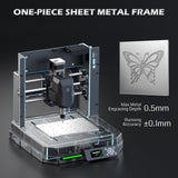Cubiko desktop CNC router with one-piece sheet metal frame and transparent base, alongside a detailed butterfly engraving on metal showing 0.5mm max depth and ±0.1mm accuracy