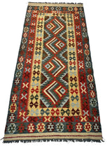 Rectangular Afghani Maimana Kilim runner rug with geometric diamond motifs in reds, blues, yellows, and creams, featuring zigzag and cross patterns and fringed edges.