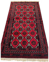 Hand-knotted Afghani Baluch wool rug with a red and black geometric pattern featuring repeated diamond and medallion motifs, bordered by intricate linear designs and white fringes.