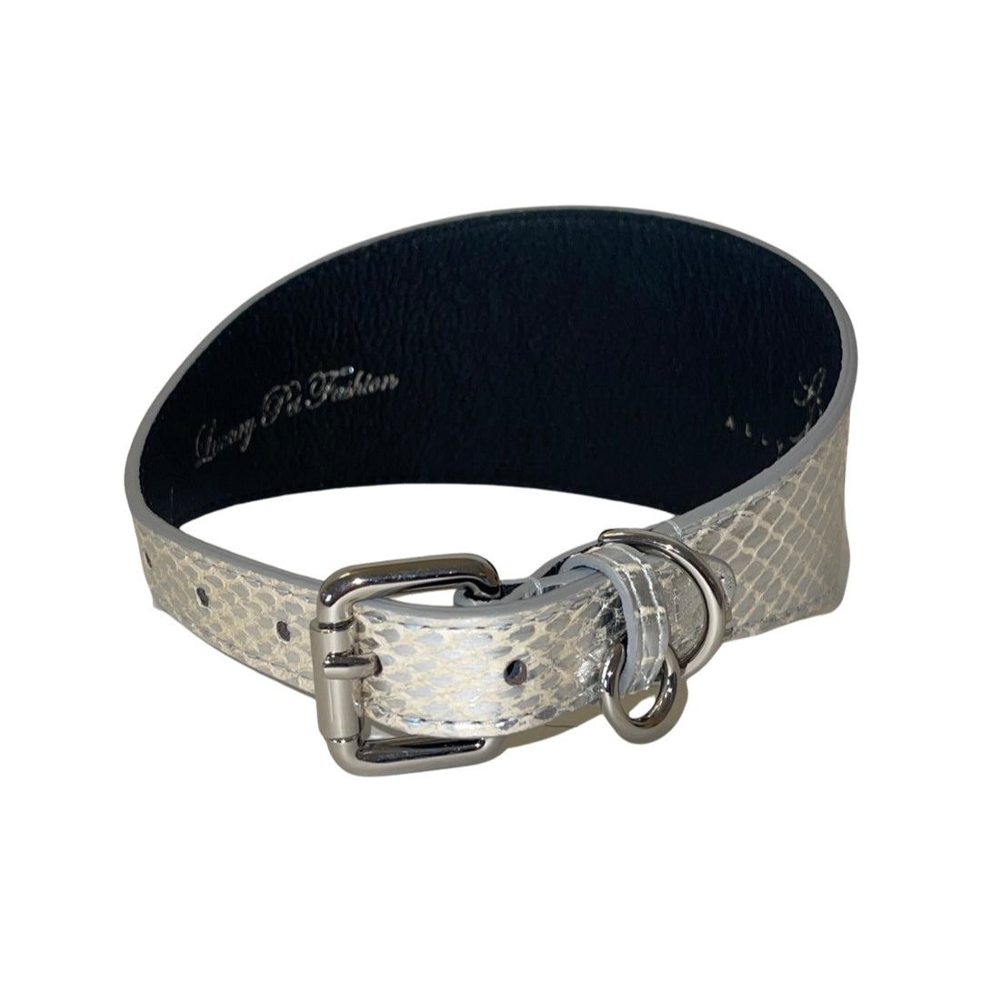 Silver snake-patterned dog collar with black interior lining and silver buckle hardware, shown in a circular shape on white background.