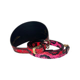 4-inch wide collar and matching leash set with a snake pattern in fuchsia, light pink, red, and black colors, featuring gold-tone buckles and a black interior lining.