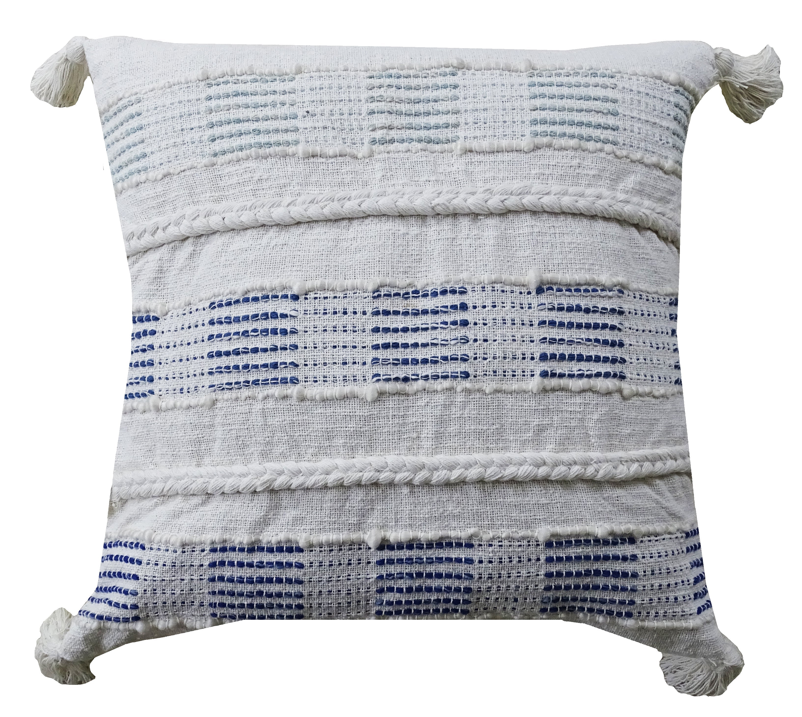 Blue and white square throw pillow with tassels on a sofa
