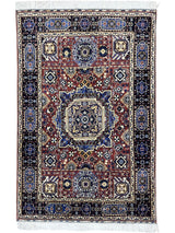 Hand-knotted Afghani Mamluk rug in blue and brown with geometric motifs, displayed on wooden floor