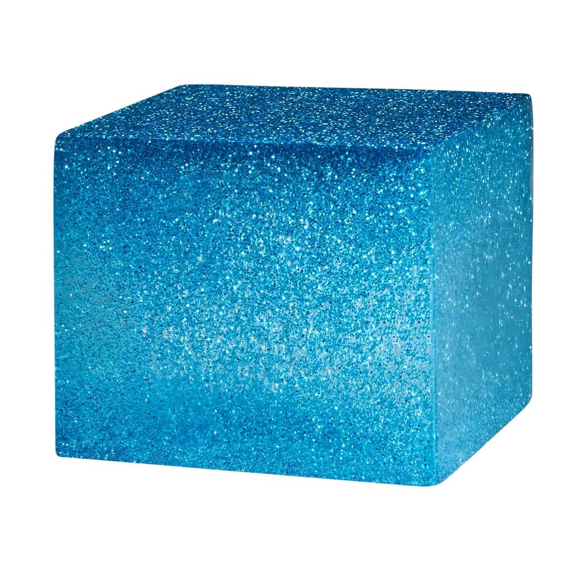 Blue glittery cube on a white background