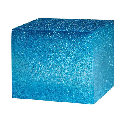 Blue glittery cube on a white background
