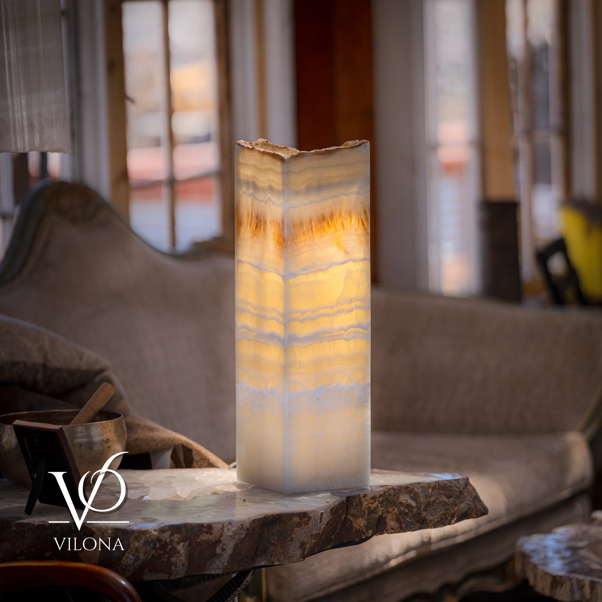Golden Cloud Onyx Square Table Lamp illuminated, showing natural banding of onyx and square base
