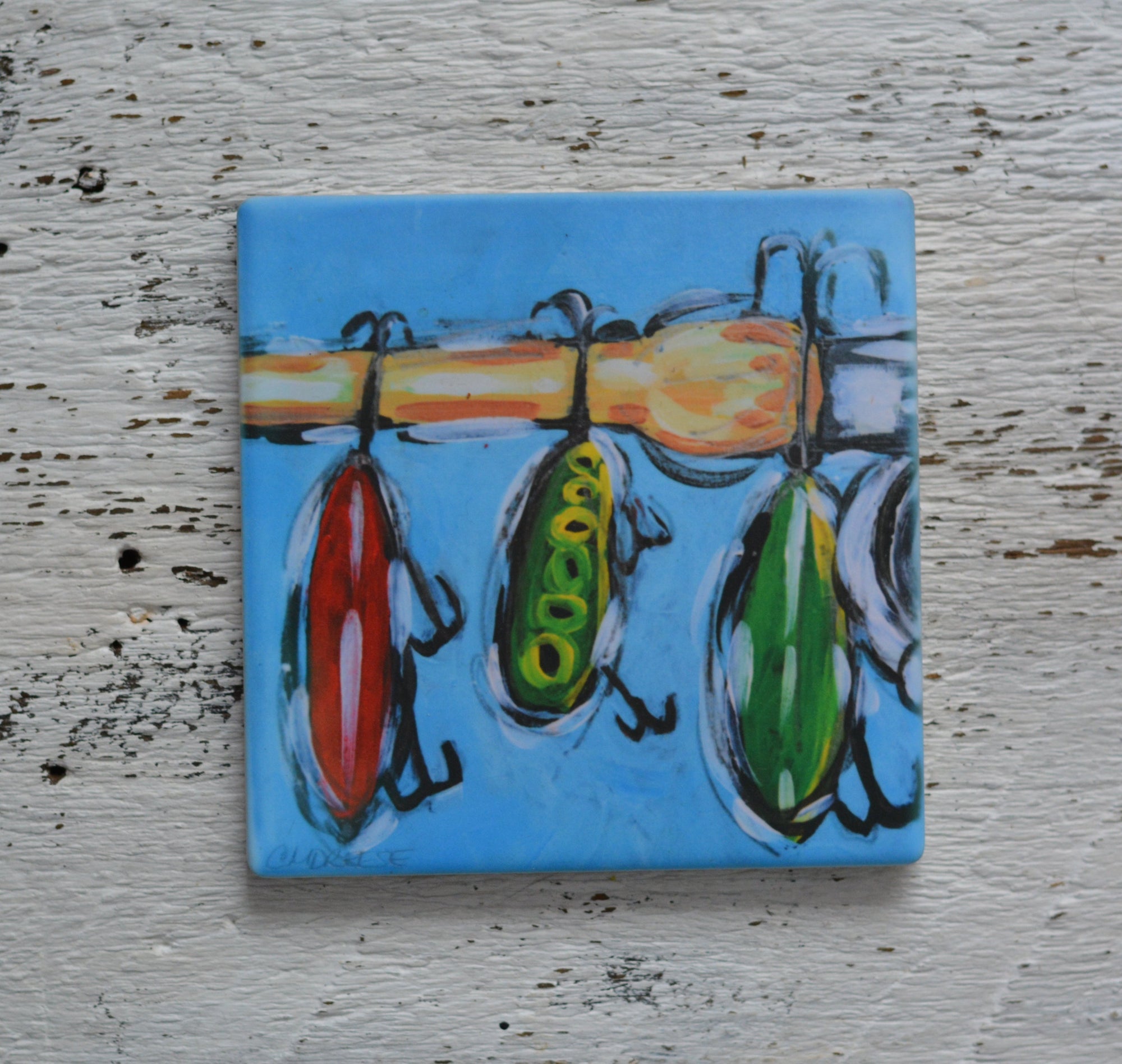 Fishing Lures III bright artwork coaster on wooden surface