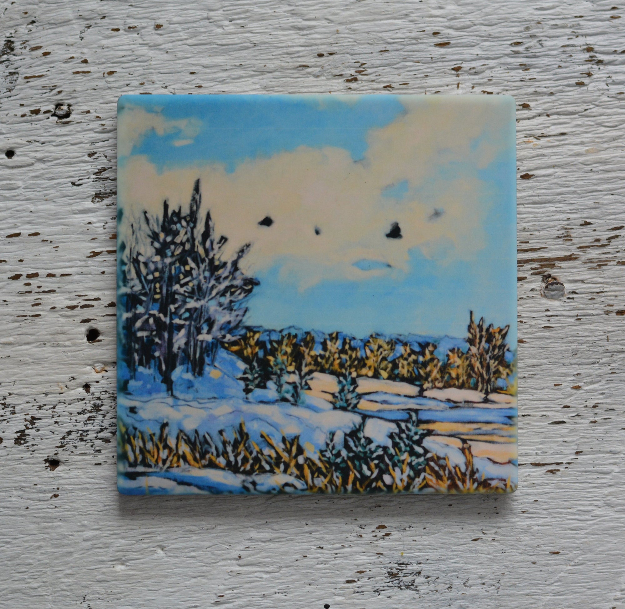 Coaster featuring winter-themed bright, colorful art by Christi Dreese