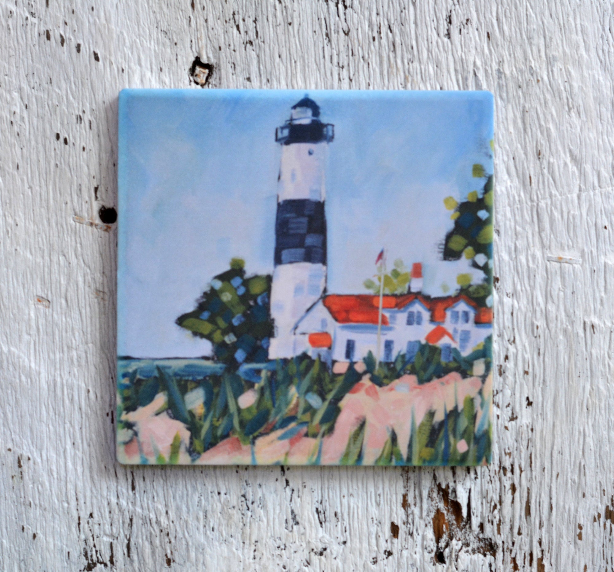 Coaster, trivet, and magnet with Big Sable Point Lighthouse artwork by Dreese Fine Art