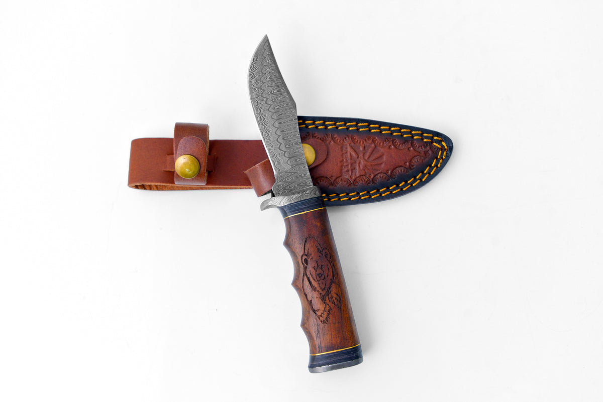 Grizzly Timberline Damascus Knife TK-099 showcasing its Damascus steel blade and black walnut handle with bear engraving